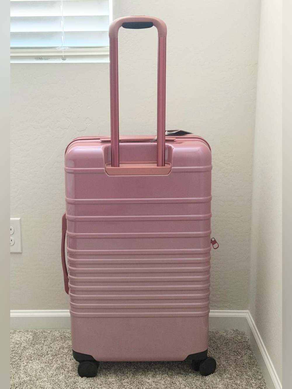 The Medium Check-in Luggage in Wicked Pink - Picture 2 of 4